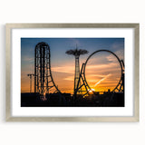 Textured abstract art print of Coney Island, featuring muted blues and grays on a framed silver mat.