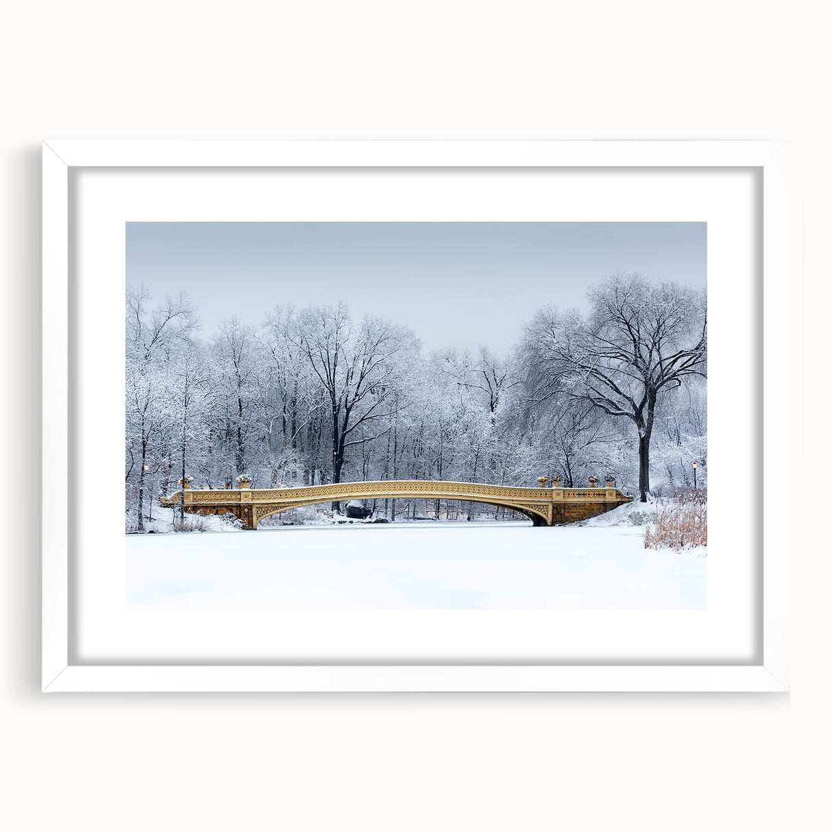 Abstract art print of Central Park in muted green and brown tones on a framed white mat, suitable for dining room decor.