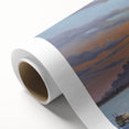 Art deco poster of Ellis Island with muted blue and peach tones on rolled canvas.