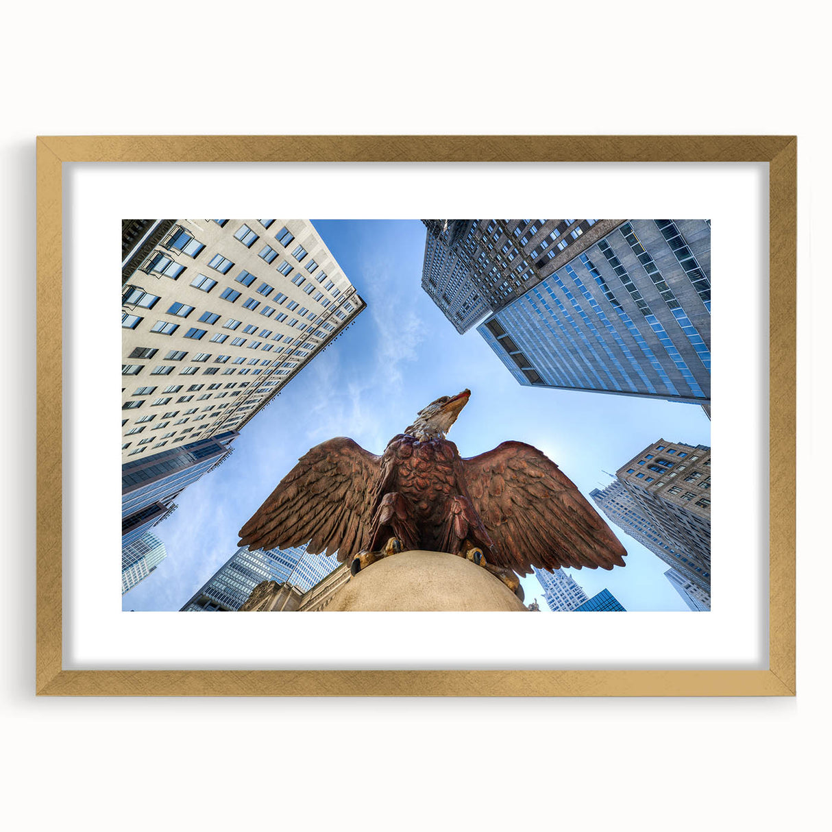 Extra large abstract art print of New York City's Grand Central Station in muted gold and gray tones, framed with a gold mat.