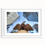 Abstract art print of NYC's Grand Central in muted gray and blue tones, framed with a white mat, ideal for dining room decor.