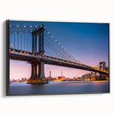 Black and white wall art featuring the Manhattan Bridge, in a vintage poster style on framed canvas.