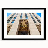 Extra large abstract art print of colorful, textured New York City skyline on a black framed canvas.