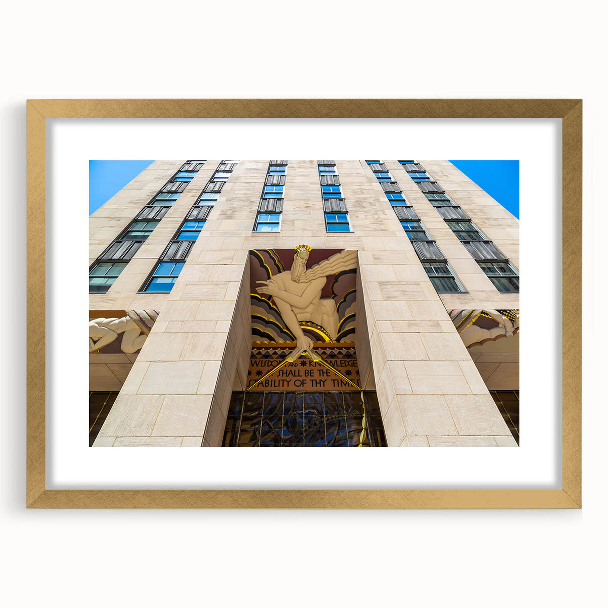 Extra large abstract art print of NYC Rockefeller scenery in muted gray and gold tones on a framed canvas.