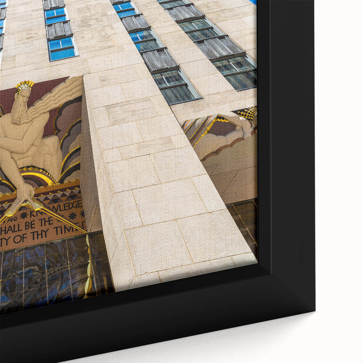 Black wall art featuring a textured depiction of the NYC Rockefeller skyline in vibrant colors on a framed canvas.