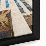 Black wall art featuring a textured depiction of the NYC Rockefeller skyline in vibrant colors on a framed canvas.