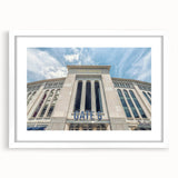 Abstract art print of NYC skyline in muted gray tones on a white-framed canvas, suitable for dining room decor.