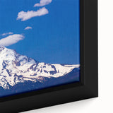 Close-up of a framed canvas featuring Mount Hood in Oregon with textured, colorful art on a black background.