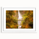 Abstract art print of Multnomah Falls in Oregon, featuring muted green and blue tones on a framed white mat.