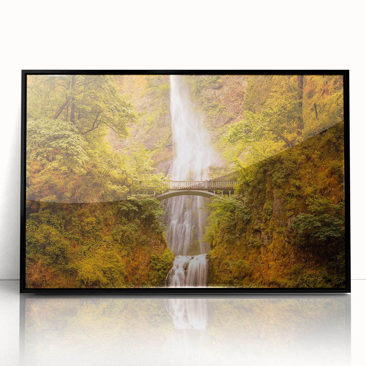 Large abstract wall art depicting Multnomah Falls in muted green and blue tones, framed in black acrylic.