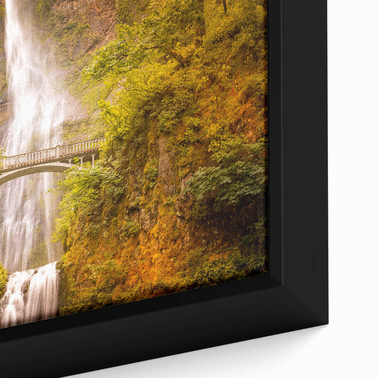 Framed canvas of Multnomah Falls in Oregon featuring textured, colorful art on a black background.