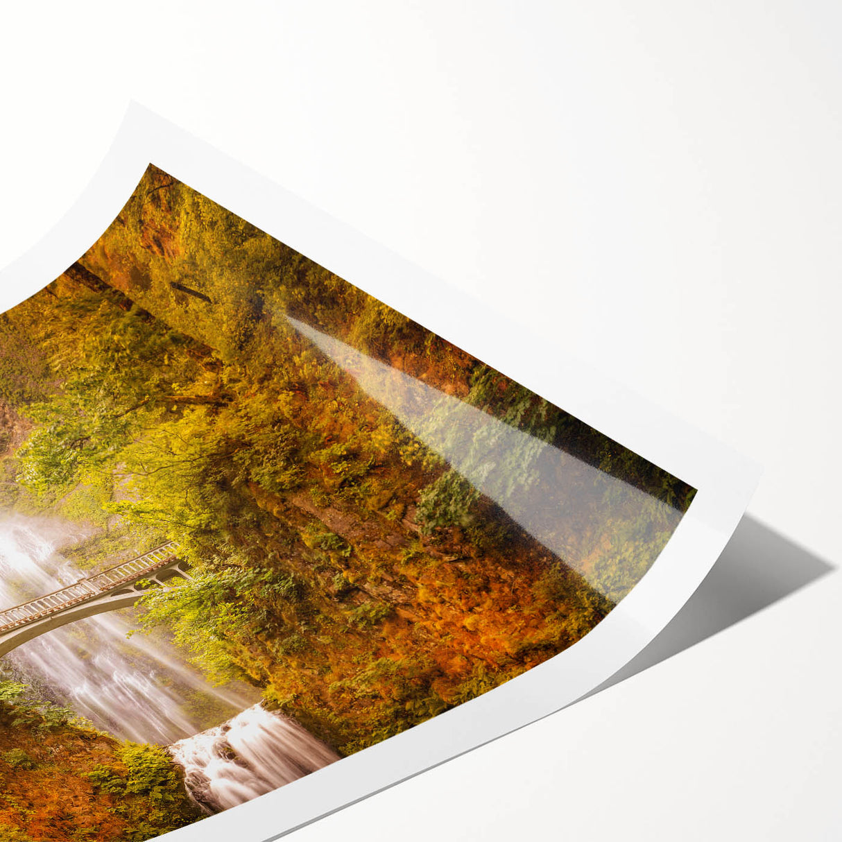 Extra large wall art featuring Multnomah Falls in Oregon, depicted in vibrant green and blue tones on a rolled canvas.