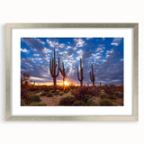 Textured art print of abstract Phoenix valley in muted earth tones, framed in silver, ideal for bedroom ambiance.