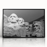 Acrylic print of Mt. Rushmore in black frame, featuring muted gray tones, ideal for modern art wall decor.
