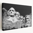 Side view of a stretched canvas featuring a realistic depiction of Mount Rushmore in natural tones.