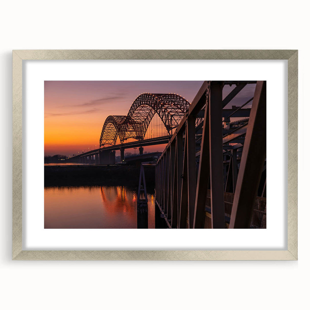 Textured abstract art print of Memphis scenery in muted earth tones, framed in silver, ideal for bedroom art.