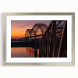 Textured abstract art print of Memphis scenery in muted earth tones, framed in silver, ideal for bedroom art.
