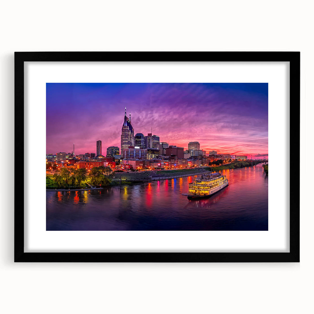 Colorful abstract art print of Nashville skyline in vibrant hues on a framed canvas, suitable for living room decor.