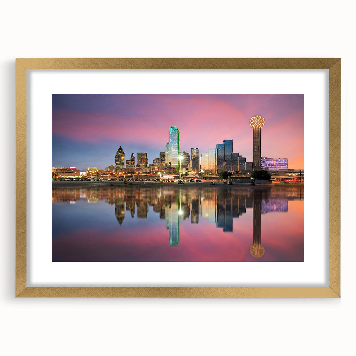 Extra large abstract art print of Dallas skyline in gold frame, featuring textured brush strokes in muted earth tones.