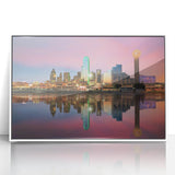 Art deco poster of Dallas skyline in muted gray and blue tones, acrylic print framed in white.