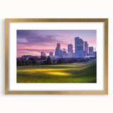 Extra large wall art featuring a textured abstract print of the Houston skyline in muted gold and gray tones.