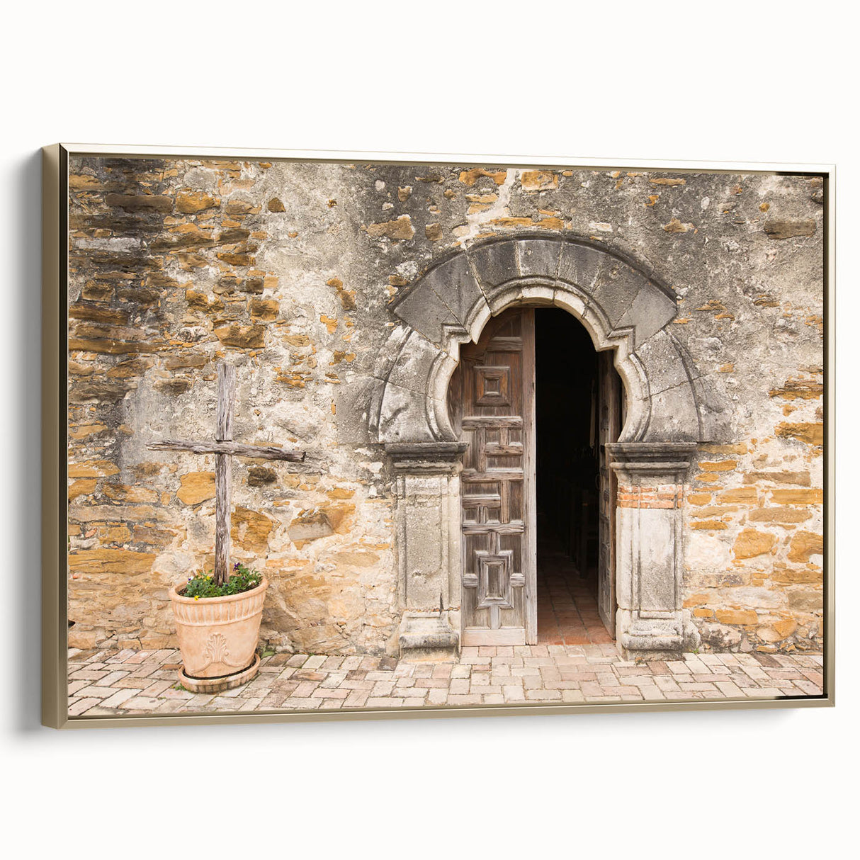 Framed canvas wall art depicting a vintage-style San Antonio landscape in muted gold and black tones.