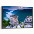 Black and white wall art featuring a vintage poster of the West Virginia landscape on a framed canvas.