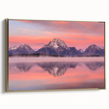 Framed canvas wall art depicting the Grand Tetons in muted earth tones, ideal for bedroom decor.