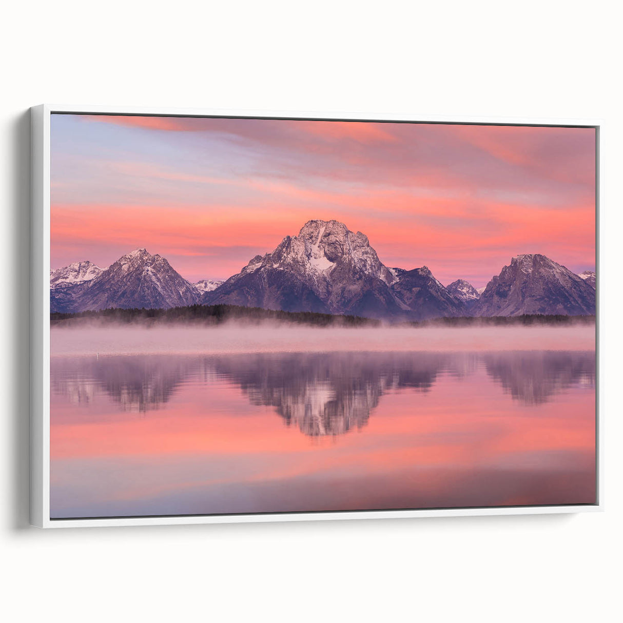 Vintage poster art of Wyoming's Grand Tetons in vibrant colors, framed in white, ideal for living room decor.