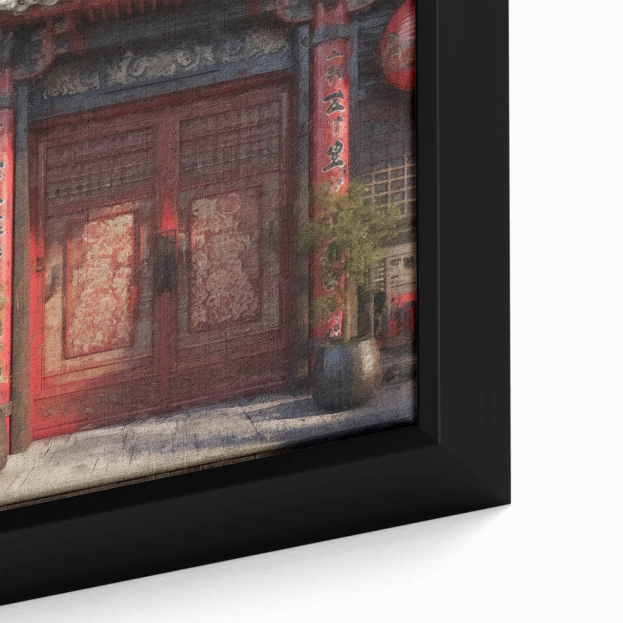 Close-up of a large framed canvas featuring a textured Japanese door design in black with colorful accents.