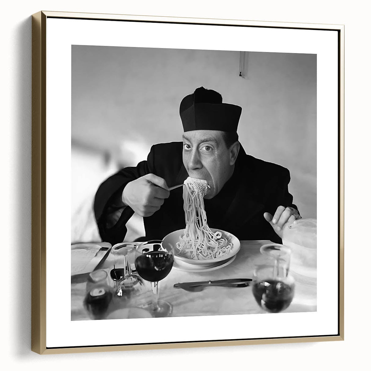 Framed canvas wall art featuring a vintage poster-style landscape painting in black and silver tones.