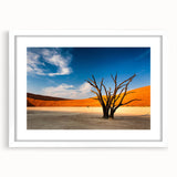 Extra large abstract art print of Namibian scenery in textured style, featuring earthy tones, framed with a white mat.