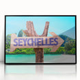 Large abstract wall art depicting the Seychelles scenery in muted blue and green tones on a framed acrylic.