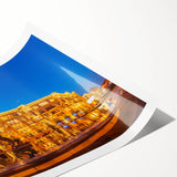 Extra large wall art featuring line art flowers in muted earth tones on a rolled canvas.