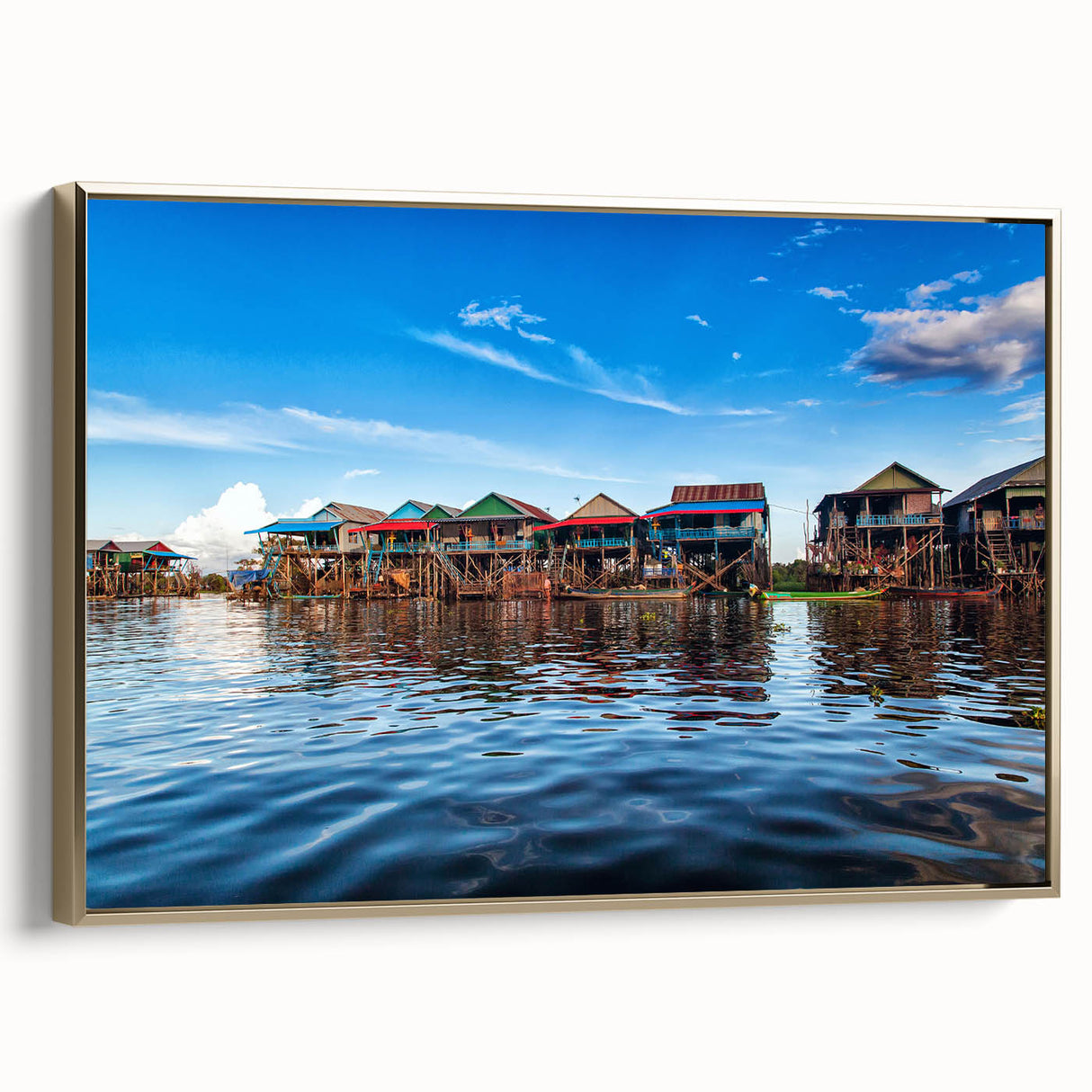 Framed canvas of a Cambodian landscape in muted gold and black tones, ideal for bedroom wall art.