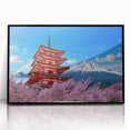 Large abstract wall art of Mount Fuji with muted blue and white tones, framed in black acrylic.