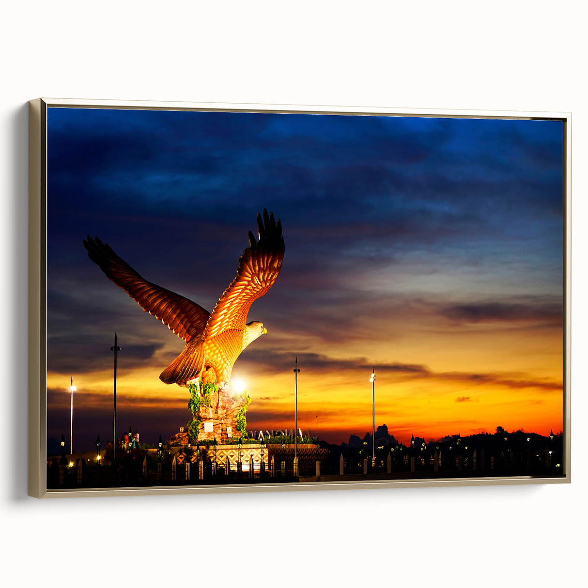 Framed canvas featuring a vintage-style landscape painting of a Malaysian scene in muted gold and black tones.