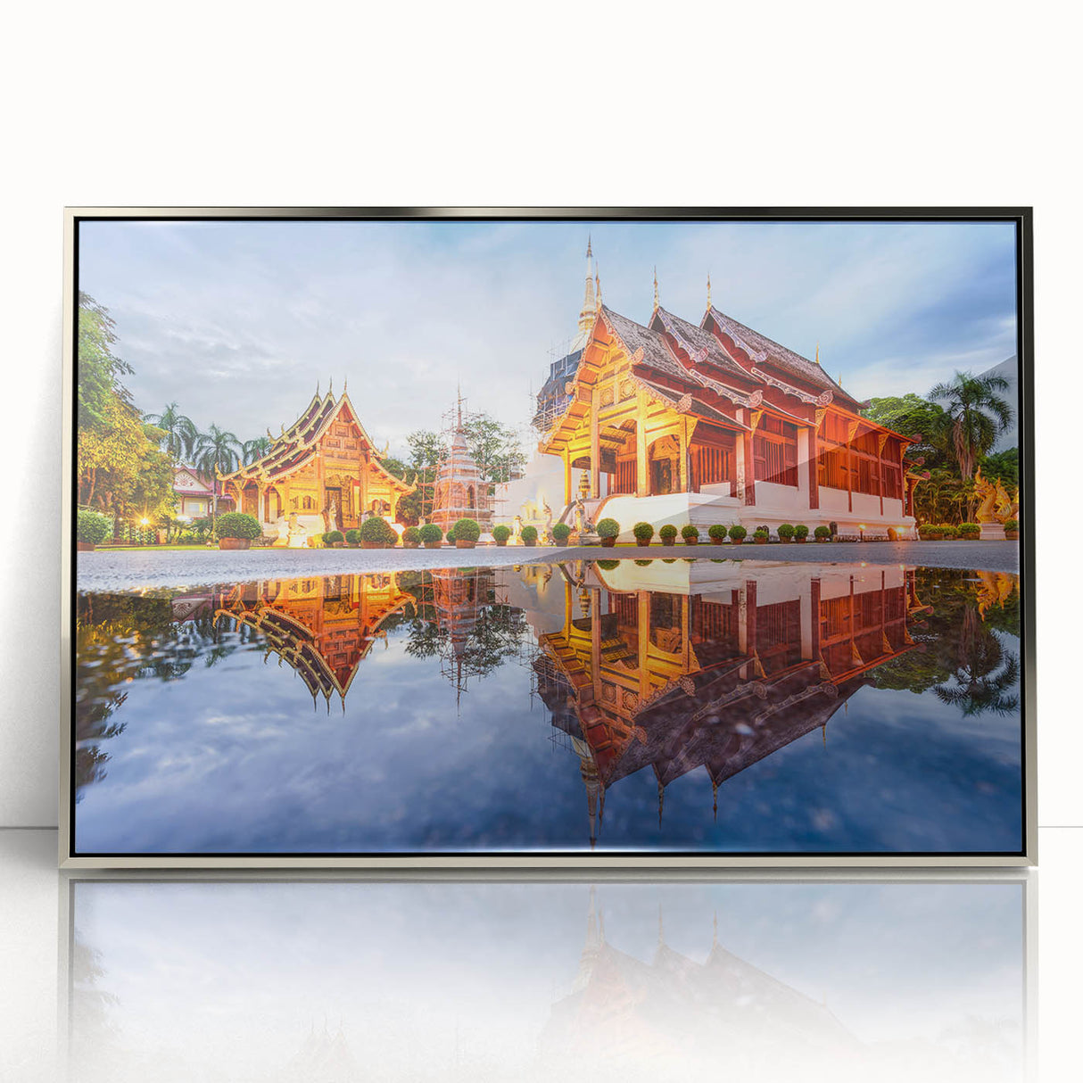 Mid-century modernist art depicting a serene Thai landscape in muted green and blue tones on a framed acrylic print.