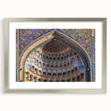 Textured art print of an abstract scenery in muted earth tones, framed in silver, ideal for bedroom decor.