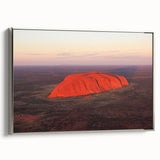 Extra large framed canvas of Ayers Rock in vintage poster style with a colorful palette, ideal for living room decor.