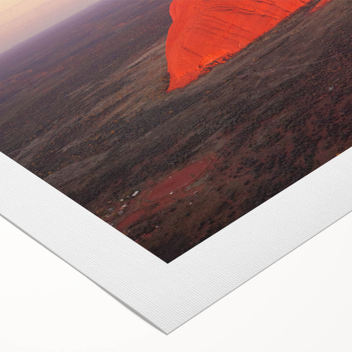 Art deco poster of Ayers Rock in muted orange and brown tones on rolled canvas, suitable for dining room wall art.