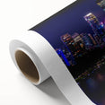 Art Deco poster of Brisbane skyline in pastel shades on rolled canvas, perfect for nursery wall art.