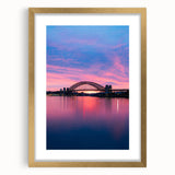 Abstract art print of Sydney skyline in muted gold and blue tones on a framed canvas, suitable for dining room decor.