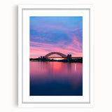 Textured abstract art print of Sydney scenery in muted blue and gray, framed with a white mat, ideal for bedroom art.