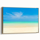 Framed canvas featuring a vintage-style landscape painting of the Caribbean with muted gold and black tones.