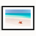 Abstract art print featuring vibrant, colorful Caribbean scenery on a large black-framed canvas, ideal for living room decor.