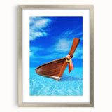 Extra large abstract art print of a Caribbean scenery, displayed in a silver frame with mat.
