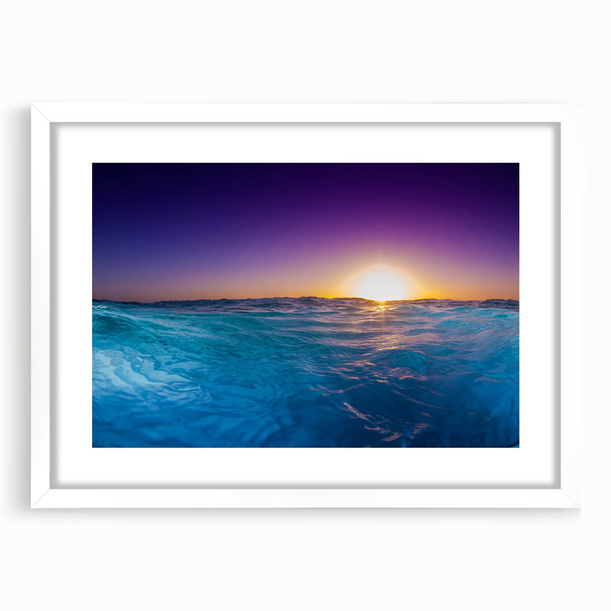 Textured abstract art print depicting Caribbean scenery in muted blue and green tones on a white framed canvas.