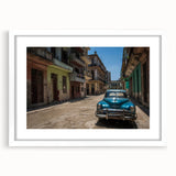 Textured abstract art print depicting a Caribbean Cuba scenery in vibrant colors on a framed white mat.
