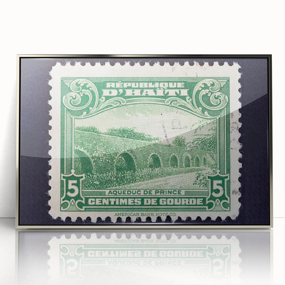 Art deco poster of a Caribbean scenery in vibrant blues and greens, framed in silver acrylic.